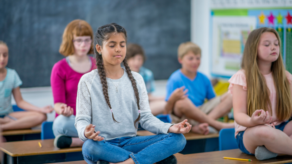Students in school practicing mindfulness